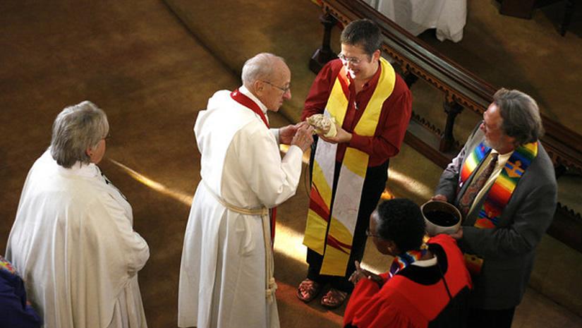 J Zibel serves communion to bishops at the 2008 Extraordinary Ordination